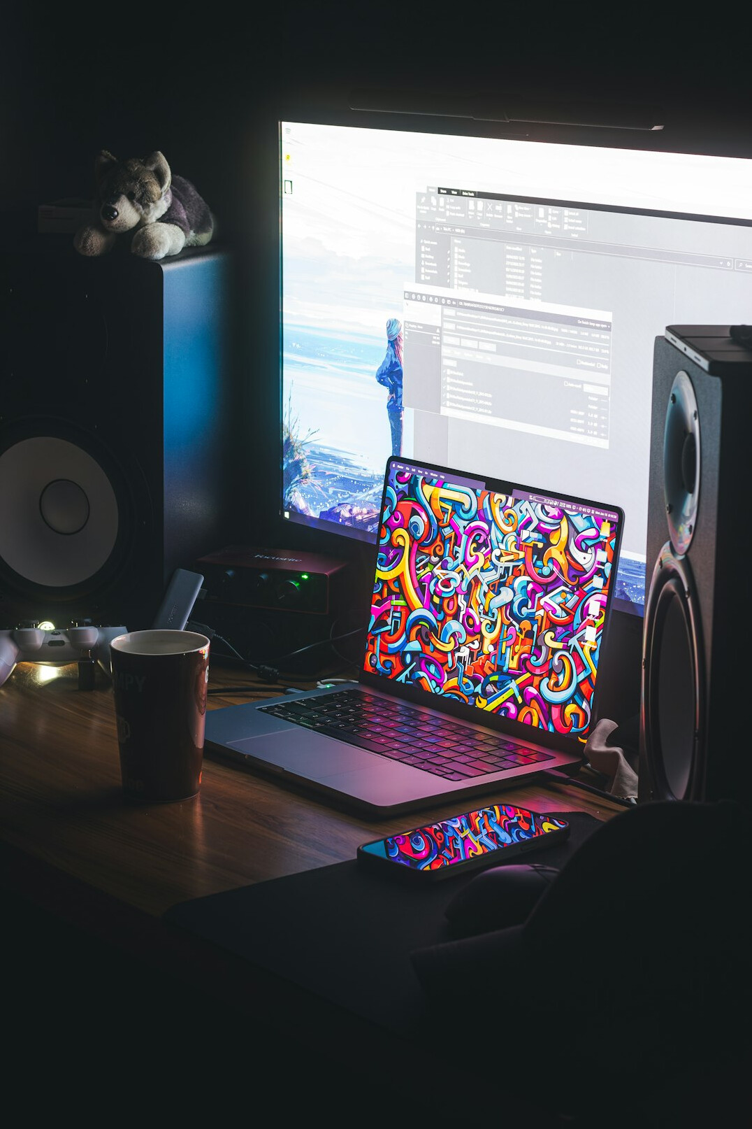 writer typing on laptop in dim room