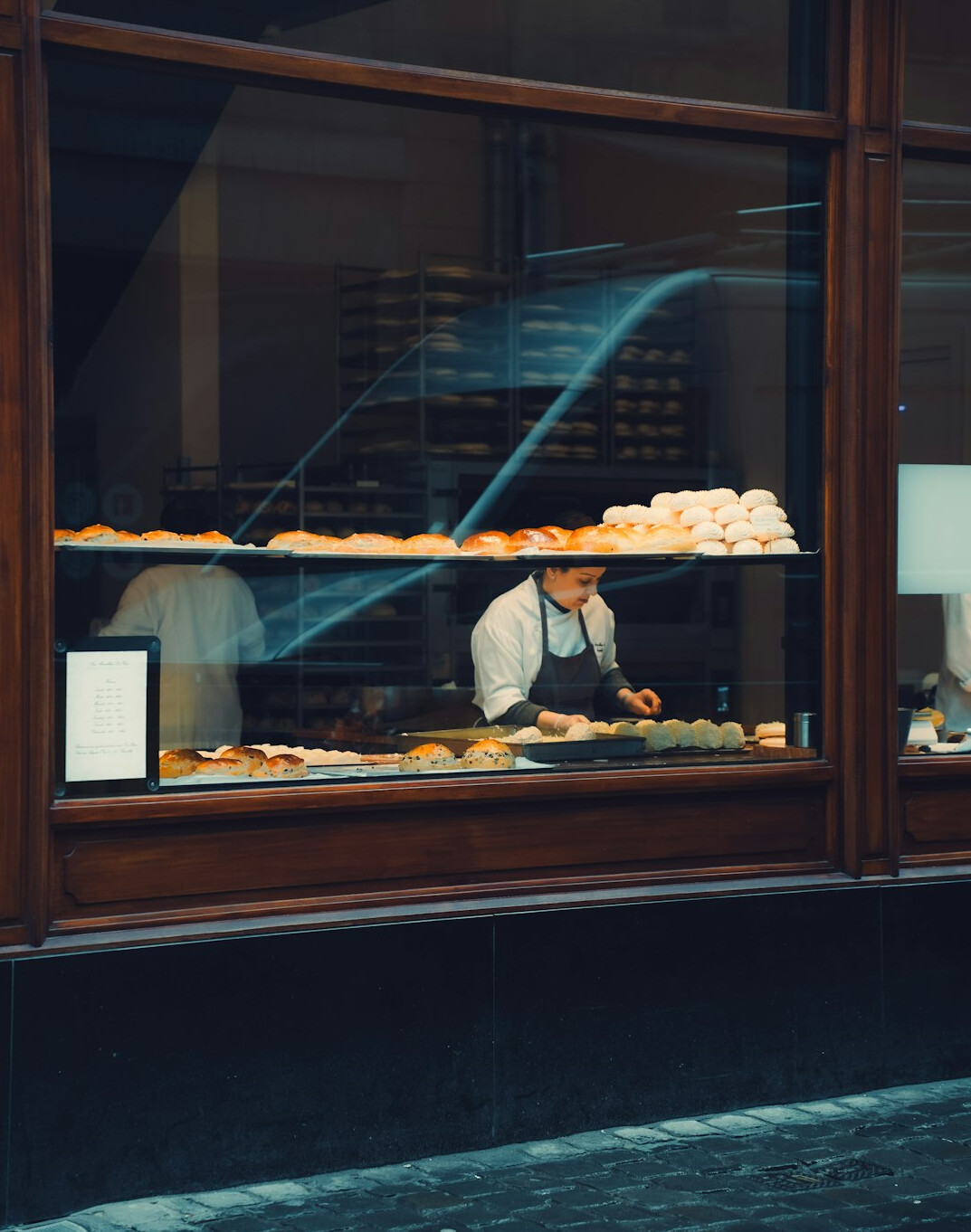 writer observing people in bakery